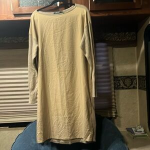 Long sleeve sweater and cotton dress. Beige in color.